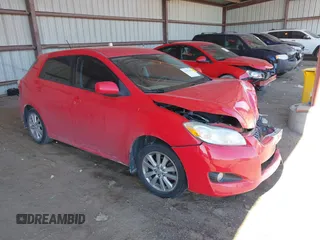 2009 Toyota Matrix with VIN 2T1KU40E39C148694, listed as a IAAI auction lot 41692462 with 128,440 mi miles. Bid and sale history available at carsss.com. Image 1.