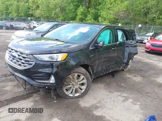 2022 Ford Edge Titanium with VIN 2FMPK4K95NBA45450, listed as a IAAI auction lot 42149752 with Not provided miles and . Bid and sale history available at DreamBid. Image 16.