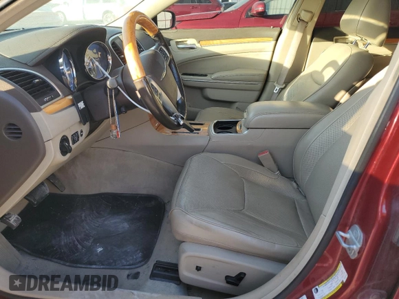 2012 Chrysler 300 C with VIN 2C3CCAKT3CH197140, listed as a Copart auction lot 82628384 with 167,304 mi miles and Salvage Title. Bid and sale history available at DreamBid. Image 7.