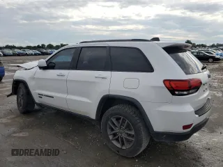 2017 Jeep Grand Cherokee 75th Anniversary with VIN 1C4RJEAG3HC696232, listed as a Copart auction lot 57362055 with 105,440 mi miles and Salvage title. Bid and sale history available at DreamBid. Image 2.