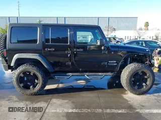2018 Jeep Wrangler JK Unlimited Sport S with VIN 1C4BJWDG7JL818843, listed as a IAAI auction lot 41506058 with 43,563 mi miles. Bid and sale history available at carsss.com. Image 14.