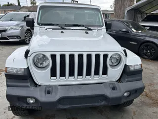 2023 Jeep Wrangler Sahara with VIN 1C4HJXENXPW586579, listed as a IAAI auction lot 41795621 with 34,433 mi miles. Bid and sale history available at carsss.com. Image 6.