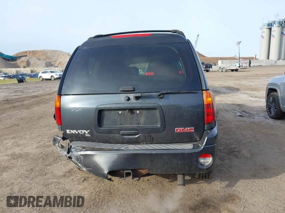 2005 GMC Envoy SLT z VIN 1GKET16M156142931, wystawiony jako IAAI lot #41584914 z przebiegiem 215 452 mil mil oraz . Historia ofert i sprzedaży dostępna na DreamBid. Obrazek 16.