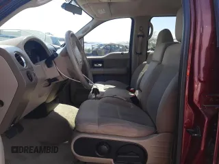 2006 Ford F-150 XLT with VIN 1FTPW12556KB24158, listed as a Copart auction lot 58204215 with 156,338 mi miles and Salvage title. Bid and sale history available at DreamBid. Image 7.