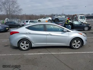2011 Hyundai Elantra Ltd with VIN KMHDH4AE9BU140051, listed as a IAAI auction lot 41721100 with 185,075 mi miles. Bid and sale history available at carsss.com. Image 12.