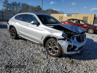 2021 BMW X4 xDrive30i with VIN 5UX2V1C04M9G96019, listed as a Copart auction lot 87287934 with Not provided miles and Salvage title. Bid and sale history available at DreamBid. Image 4.