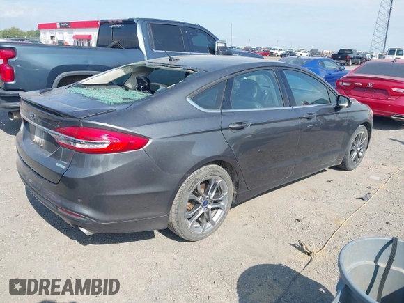 2018 Ford Fusion SE with VIN 3FA6P0HD2JR253714, listed as a IAAI auction lot 42059879 with 115,995 mi miles and . Bid and sale history available at DreamBid. Image 4.