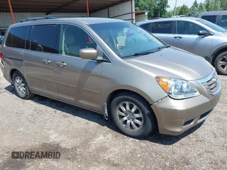 2010 Honda Odyssey EX with VIN 5FNRL3H59AB019293, listed as a IAAI auction lot 42769362 with 256,541 mi miles and . Bid and sale history available at DreamBid. Image 1.