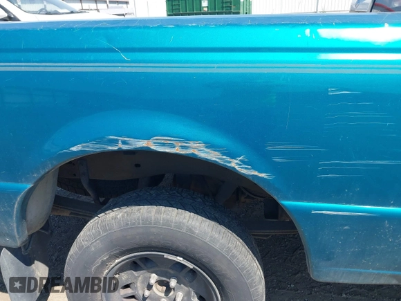 1994 Ford Ranger Splash z VIN 1FTCR14X1RPB54821, wystawiony jako IAAI lot #42386817 z przebiegiem 222 997 mil mil oraz . Historia ofert i sprzedaży dostępna na DreamBid. Obrazek 6.