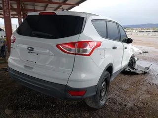 2016 Ford Escape S with VIN 1FMCU0F74GUC43895, listed as a IAAI auction lot 41751608 with 104,647 mi miles. Bid and sale history available at carsss.com. Image 4.