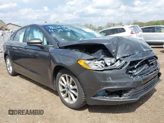2017 Ford Fusion SE z VIN 3FA6P0HD6HR108623, wystawiony jako IAAI lot #42164104 z przebiegiem 152 066 mil mil oraz . Historia ofert i sprzedaży dostępna na DreamBid. Obrazek 1.