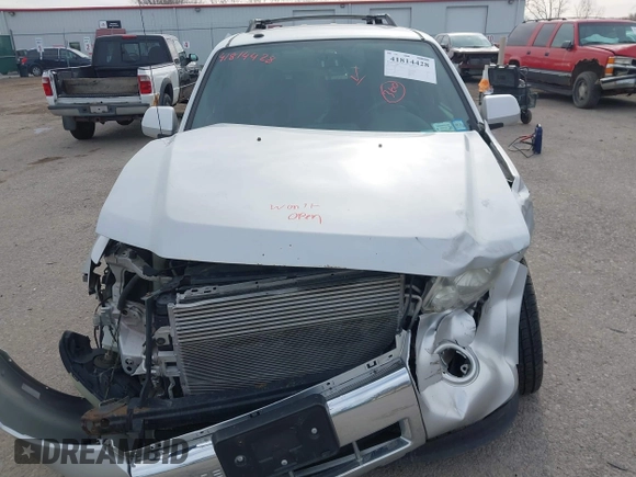 2011 Ford Escape Limited with VIN 1FMCU9EG3BKA75032, listed as a IAAI auction lot 41814428 with 177,984 mi miles and . Bid and sale history available at carsss.com. Image 12.
