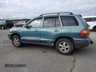 2003 Hyundai Santa Fe GLS with VIN KM8SC73D03U421863, listed as a Copart auction lot 71573724 with 184,028 mi miles and Salvage Title. Bid and sale history available at carsss.com. Image 2.