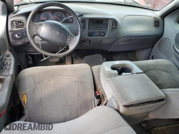 2001 Ford F-150 XLT with VIN 1FTRW07LX1KD65474, listed as a Copart auction lot 61474655 with 361,023 mi miles and Salvage title. Bid and sale history available at DreamBid. Image 8.