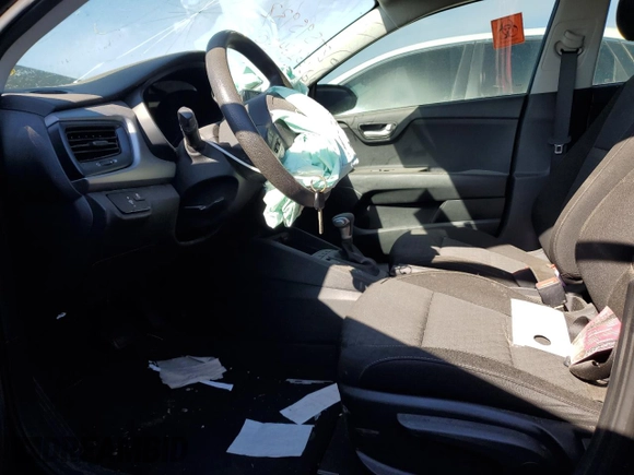 2023 Kia Rio LX with VIN 3KPA24AD7PE616450, listed as a Copart auction lot 84690444 with 28,908 mi miles and Salvage Title. Bid and sale history available at DreamBid. Image 7.