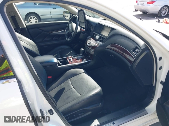 2016 Infiniti Q70 with VIN JN1EY1AP9GM470064, listed as a IAAI auction lot 42647765 with 111,474 mi miles and . Bid and sale history available at DreamBid. Image 5.