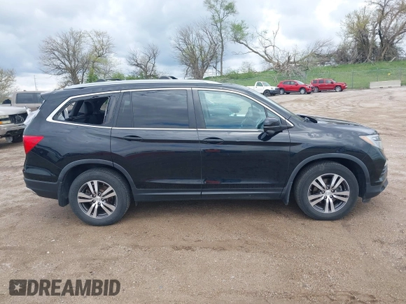 2017 Honda Pilot EX-L with VIN 5FNYF6H51HB045854, listed as a IAAI auction lot 42178053 with 114,913 mi miles and . Bid and sale history available at DreamBid. Image 14.