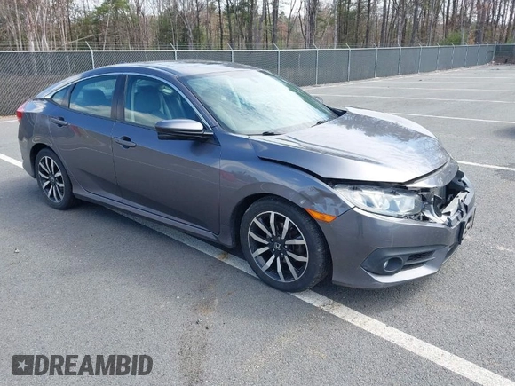 2016 Honda Civic Sedan EX-L with VIN 19XFC1F73GE201419, listed as a IAAI auction lot 42027720 with 168,134 mi miles. Bid and sale history available at carsss.com. Image 1.