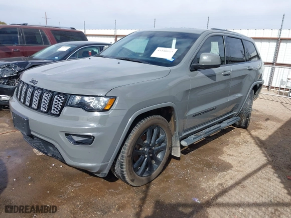 2021 Jeep Grand Cherokee Laredo X with VIN 1C4RJEAG5MC824738, listed as a IAAI auction lot 41580995 with 57,923 mi miles. Bid and sale history available at carsss.com. Image 20.
