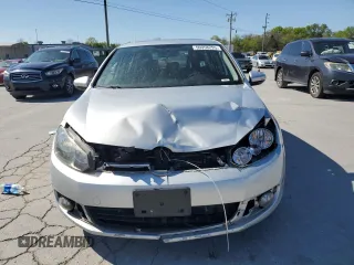 2013 Volkswagen Golf TDI w/Sunroof & Nav z VIN WVWNM7AJ0DW023226, wystawiony jako Copart lot #50958295 z przebiegiem 97 784 mil mil oraz Czysty tytuł • Clean title. Historia ofert i sprzedaży dostępna na DreamBid. Obrazek 5.