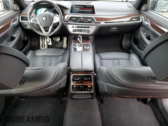 2019 BMW 7 Series 740i xDrive with VIN WBA7E4C51KGV70031, listed as a Copart auction lot 38008974 with 33,555 mi miles and . Bid and sale history available at DreamBid. Image 8.