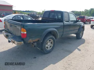 2002 Toyota Tacoma with VIN 5TEWM72NX2Z097369, listed as a IAAI auction lot 42476892 with 90,855 mi miles and . Bid and sale history available at DreamBid. Image 4.