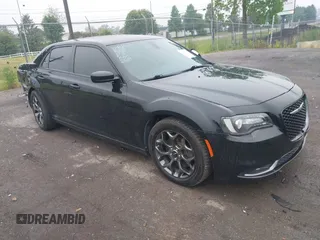 2015 Chrysler 300 S with VIN 2C3CCAGG6FH892339, listed as a IAAI auction lot 42438322 with 130,580 mi miles and . Bid and sale history available at DreamBid. Image 1.
