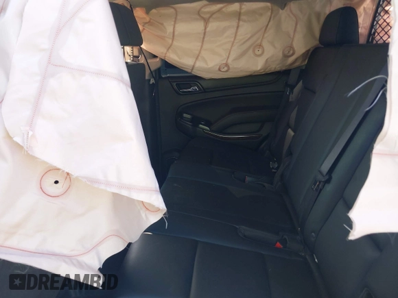 2016 Chevrolet Tahoe Commercial z VIN 1GNSKFEC1GR249946, wystawiony jako IAAI lot #42610587 z przebiegiem Nie podano mil oraz . Historia ofert i sprzedaży dostępna na DreamBid. Obrazek 8.