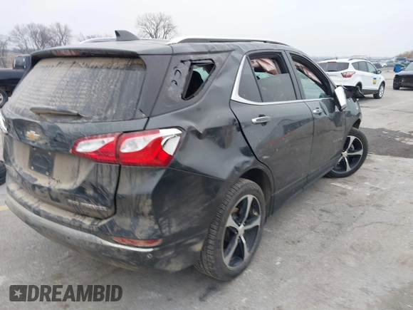 2021 Chevrolet Equinox Premier z VIN 2GNAXXEV2M6118116, wystawiony jako IAAI lot #41185151 z przebiegiem 91 837 mil mil oraz . Historia ofert i sprzedaży dostępna na DreamBid. Obrazek 4.