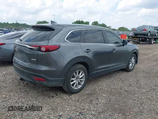 2016 Mazda CX-9 Sport z VIN JM3TCABYXG0126543, wystawiony jako IAAI lot #42256448 z przebiegiem 133 813 mil mil oraz . Historia ofert i sprzedaży dostępna na DreamBid. Obrazek 4.