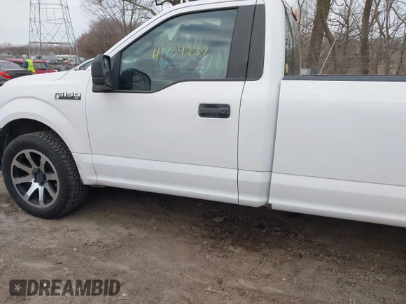 2015 Ford F-150 XL with VIN 1FTMF1C89FKD50053, listed as a IAAI auction lot 41704237 with 187,408 mi miles and . Bid and sale history available at DreamBid. Image 14.