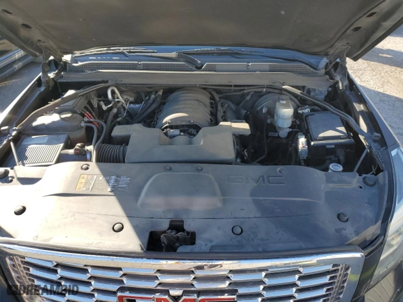 2019 GMC Yukon XL Denali with VIN 1GKS2HKJXKR368518, listed as a Copart auction lot 42833005 with 69,557 mi miles and Salvage Title. Bid and sale history available at carsss.com. Image 12.