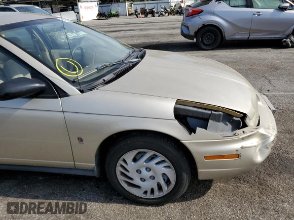 1999 Saturn SL with VIN 1G8ZK5275XZ262816, listed as a Copart auction lot 54144092 with 60,424 mi miles and Salvage title. Bid and sale history available at DreamBid. Image 9.