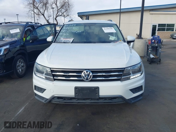 2019 Volkswagen Tiguan S with VIN 3VV1B7AX2KM039970, listed as a IAAI auction lot 41498706 with 56,907 mi miles and . Bid and sale history available at DreamBid. Image 12.