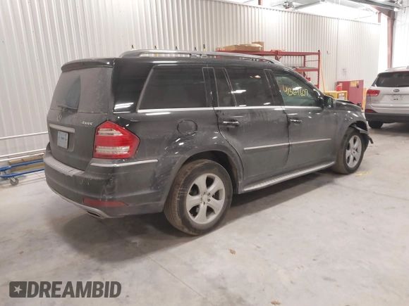 2011 Mercedes-Benz GL-Class GL 450 with VIN 4JGBF7BE2BA737203, listed as a IAAI auction lot 41364607 with 133,921 mi miles. Bid and sale history available at carsss.com. Image 4.