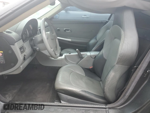 2004 Chrysler Crossfire z VIN 1C3AN69L84X014803, wystawiony jako Copart lot #56139015 z przebiegiem 102 523 mil mil oraz Szkoda całkowita • Salvage title. Historia ofert i sprzedaży dostępna na DreamBid. Obrazek 10.