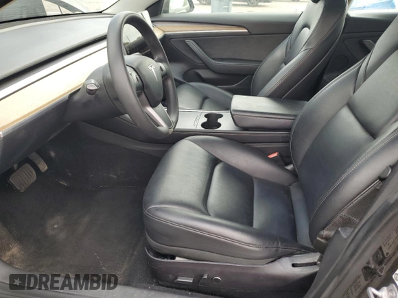 2022 Tesla Model 3 z VIN 5YJ3E1EA1NF286584, wystawiony jako Copart lot #52142755 z przebiegiem 83 340 mil mil oraz Czysty tytuł • Clean title. Historia ofert i sprzedaży dostępna na DreamBid. Obrazek 7.