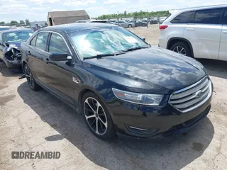 2014 Ford Taurus SEL z VIN 1FAHP2E89EG128816, wystawiony jako IAAI lot #42343167 z przebiegiem 87 329 mil mil oraz . Historia ofert i sprzedaży dostępna na DreamBid. Obrazek 1.