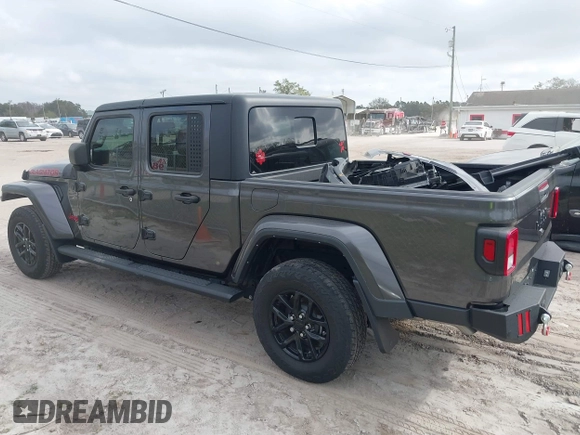 2022 Jeep Gladiator Texas Trail z VIN 1C6HJTAG0NL162804, wystawiony jako IAAI lot #41524087 z przebiegiem 17 652 mil mil oraz . Historia ofert i sprzedaży dostępna na DreamBid. Obrazek 15.