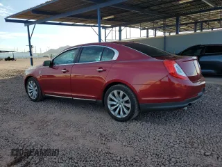 2013 Lincoln MKS z VIN 1LNHL9DK2DG618326, wystawiony jako Copart lot #56875965 z przebiegiem 150 812 mil mil oraz Szkoda całkowita • Salvage title. Historia ofert i sprzedaży dostępna na DreamBid. Obrazek 2.