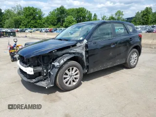 2016 Mazda CX-5 Sport with VIN JM3KE4BY9G0726784, listed as a Copart auction lot 61474165 with 112,004 mi miles and Salvage title. Bid and sale history available at DreamBid. Image 1.
