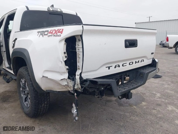 2019 Toyota Tacoma 4WD SR with VIN 5TFCZ5ANXKX204955, listed as a IAAI auction lot 41694378 with 108,410 mi miles. Bid and sale history available at carsss.com. Image 6.