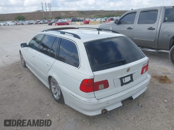 2002 BMW 5 Series 525iAT with VIN WBADS43482GD86937, listed as a IAAI auction lot 41940547 with 196,458 mi miles. Bid and sale history available at carsss.com. Image 3.