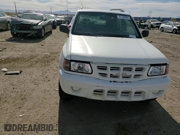 2000 Isuzu Rodeo S z VIN 4S2CK58W2Y4317915, wystawiony jako Copart lot #81780094 z przebiegiem 158 217 mil mil oraz Szkoda całkowita • Salvage title. Historia ofert i sprzedaży dostępna na DreamBid. Obrazek 11.