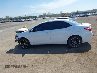 2014 Toyota Corolla L with VIN 5YFBURHE7EP049355, listed as a IAAI auction lot 42073330 with 129,605 mi miles and . Bid and sale history available at DreamBid. Image 15.