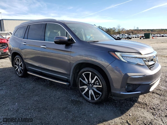 2019 Honda Pilot Touring 8-Passenger with VIN 5FNYF5H97KB002138, listed as a Copart auction lot 82107254 with 82,838 mi miles and Salvage Title. Bid and sale history available at carsss.com. Image 4.