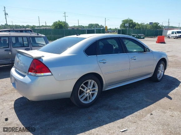2013 Chevrolet Impala LTZ with VIN 2G1WC5E30D1266641, listed as a IAAI auction lot 39649556 with 148,380 mi miles. Bid and sale history available at carsss.com. Image 4.