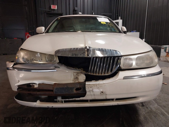 2001 Lincoln Town Car Cartier z VIN 1LNHM83W51Y609962, wystawiony jako IAAI lot #41623323 z przebiegiem 201 799 mil mil oraz . Historia ofert i sprzedaży dostępna na DreamBid. Obrazek 12.