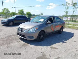 2016 Nissan Versa S Plus with VIN 3N1CN7AP1GL823488, listed as a IAAI auction lot 42060937 with 125,077 mi miles. Bid and sale history available at carsss.com. Image 2.
