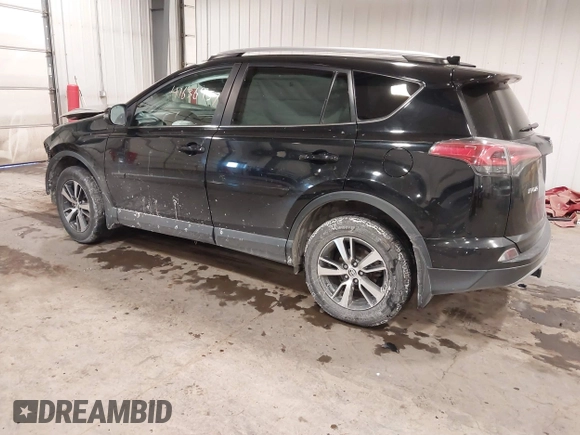 2018 Toyota RAV4 XLE with VIN 2T3RFREV3JW817989, listed as a IAAI auction lot 41636957 with 182,265 mi miles. Bid and sale history available at carsss.com. Image 3.